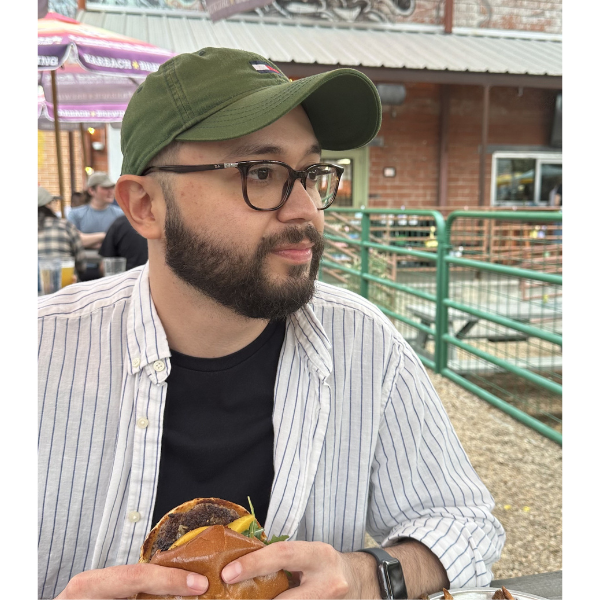 Luis enjoying an American Hamburger